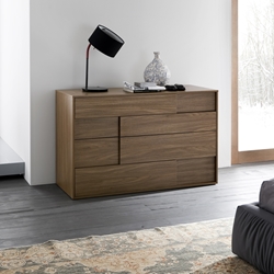 Copernicus Walnut Dresser Here to provide you with a funky, modern style storage space, the Copernicus Walnut Dresser blends right into any modern setting. It provides you with four large drawers with a soft-close feature for functionality and durability.